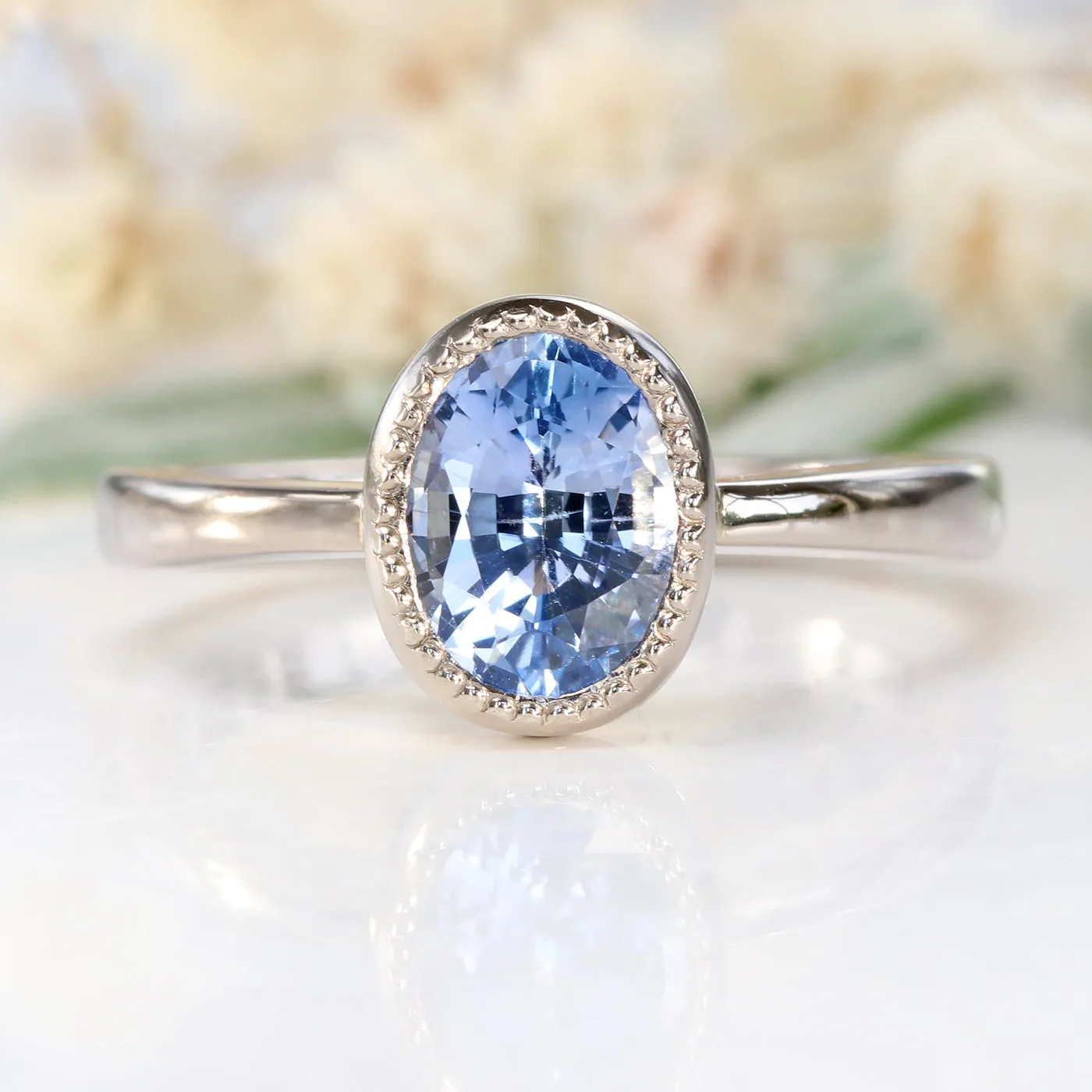 18ct White Gold Oval Cut Blue Sapphire Solitaire Engagement Ring