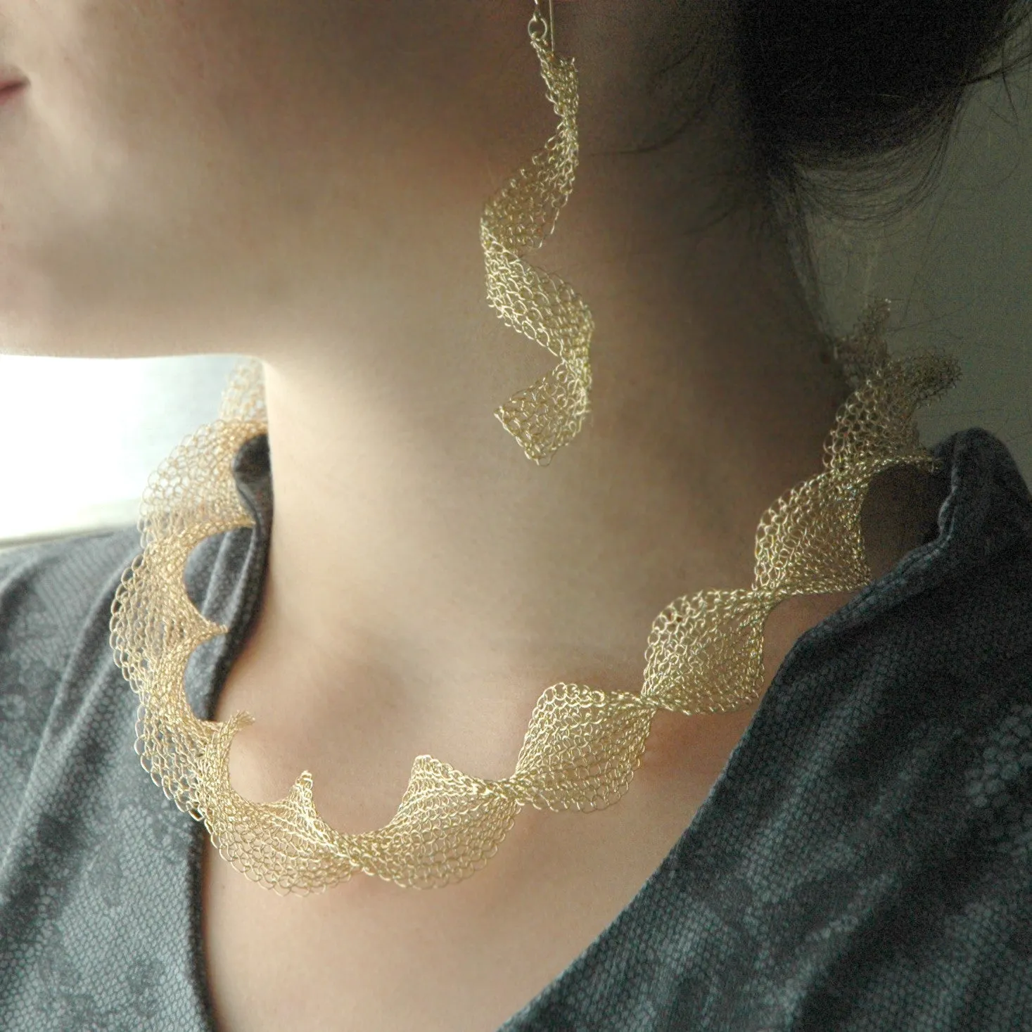 Infinity gold wire crochet earrings with pearls, long elegant knitted wire